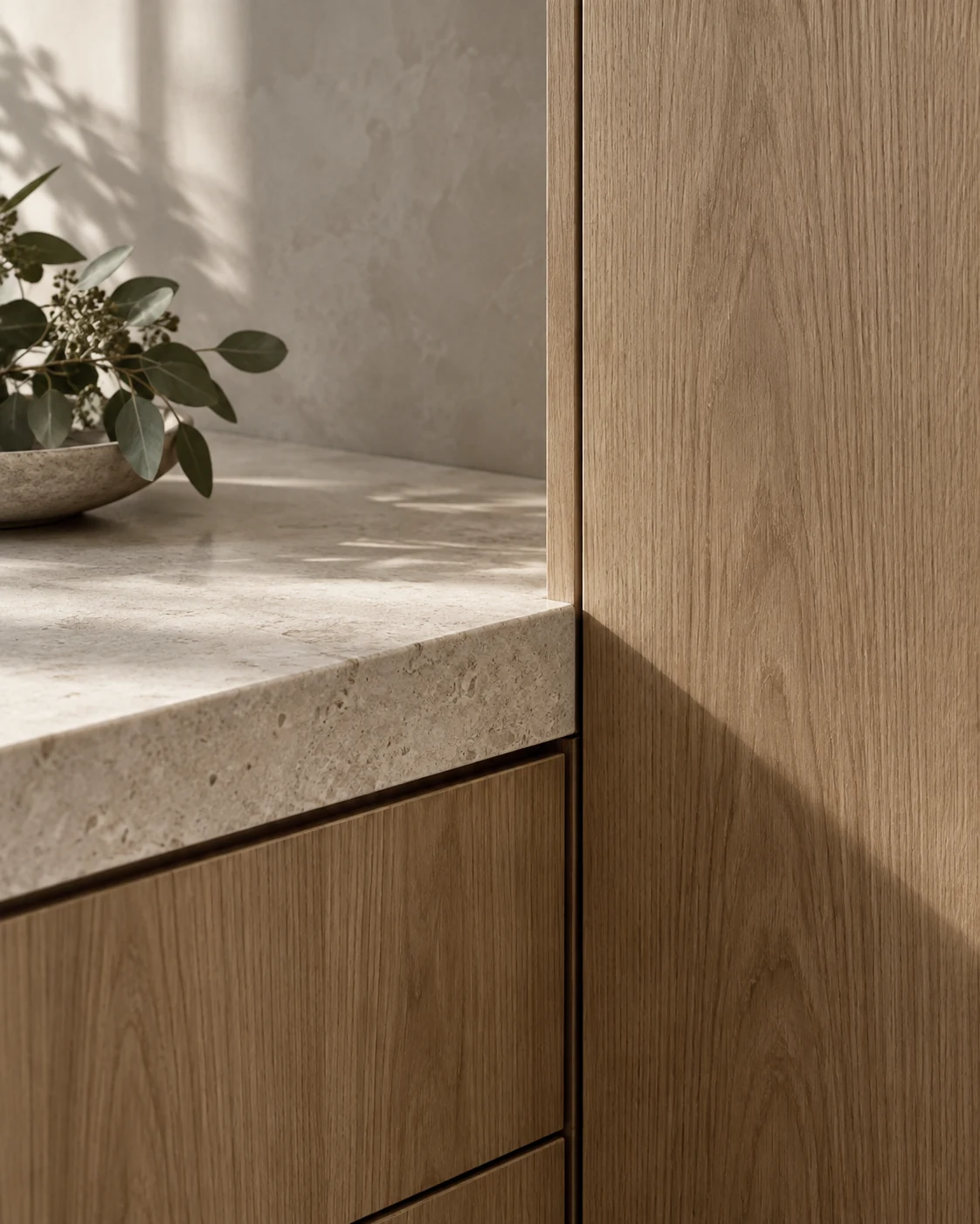 Close-up of natural oak joinery and honed stone